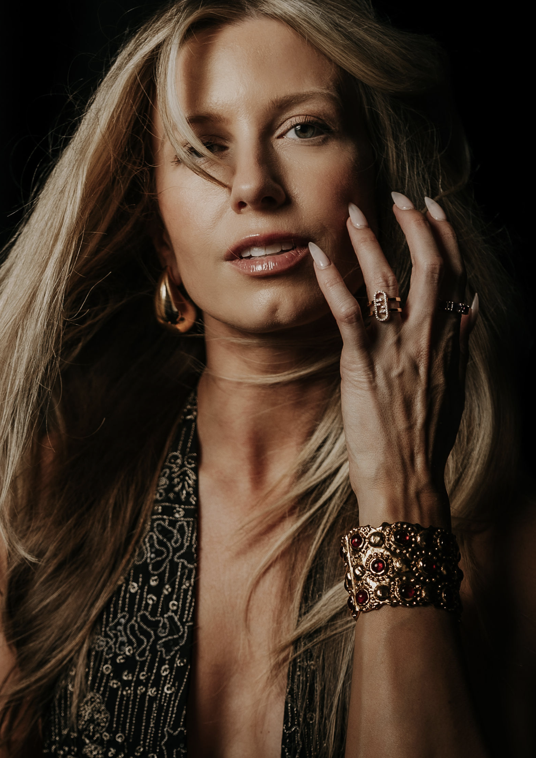 Editorial portrait with gold jewelry