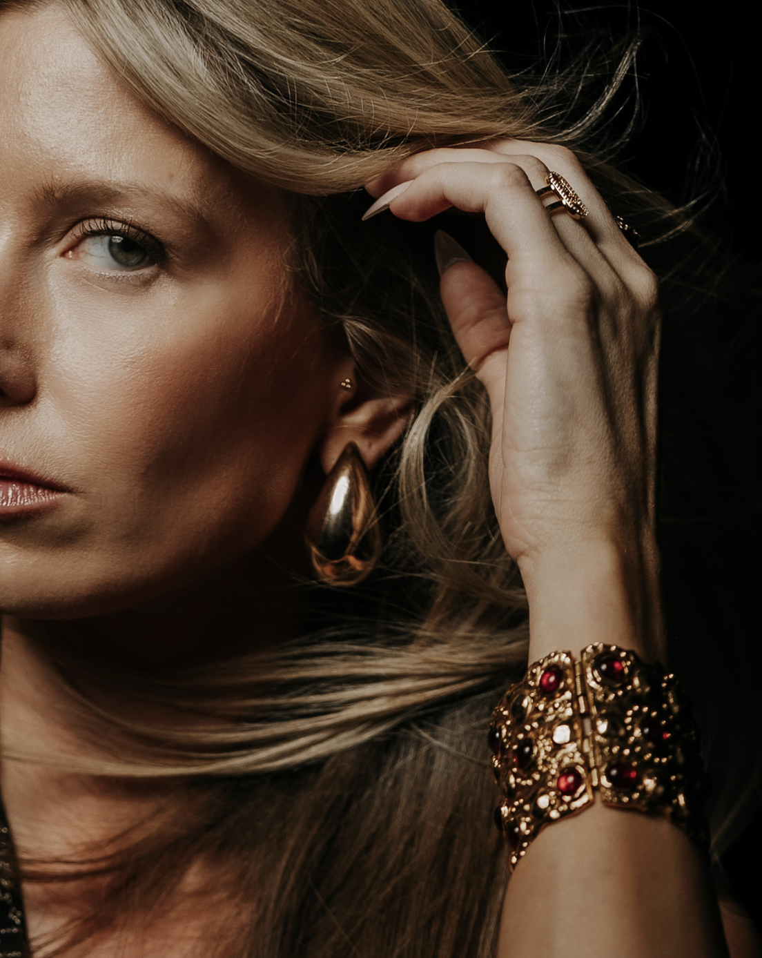 Editorial portrait with gold jewelry